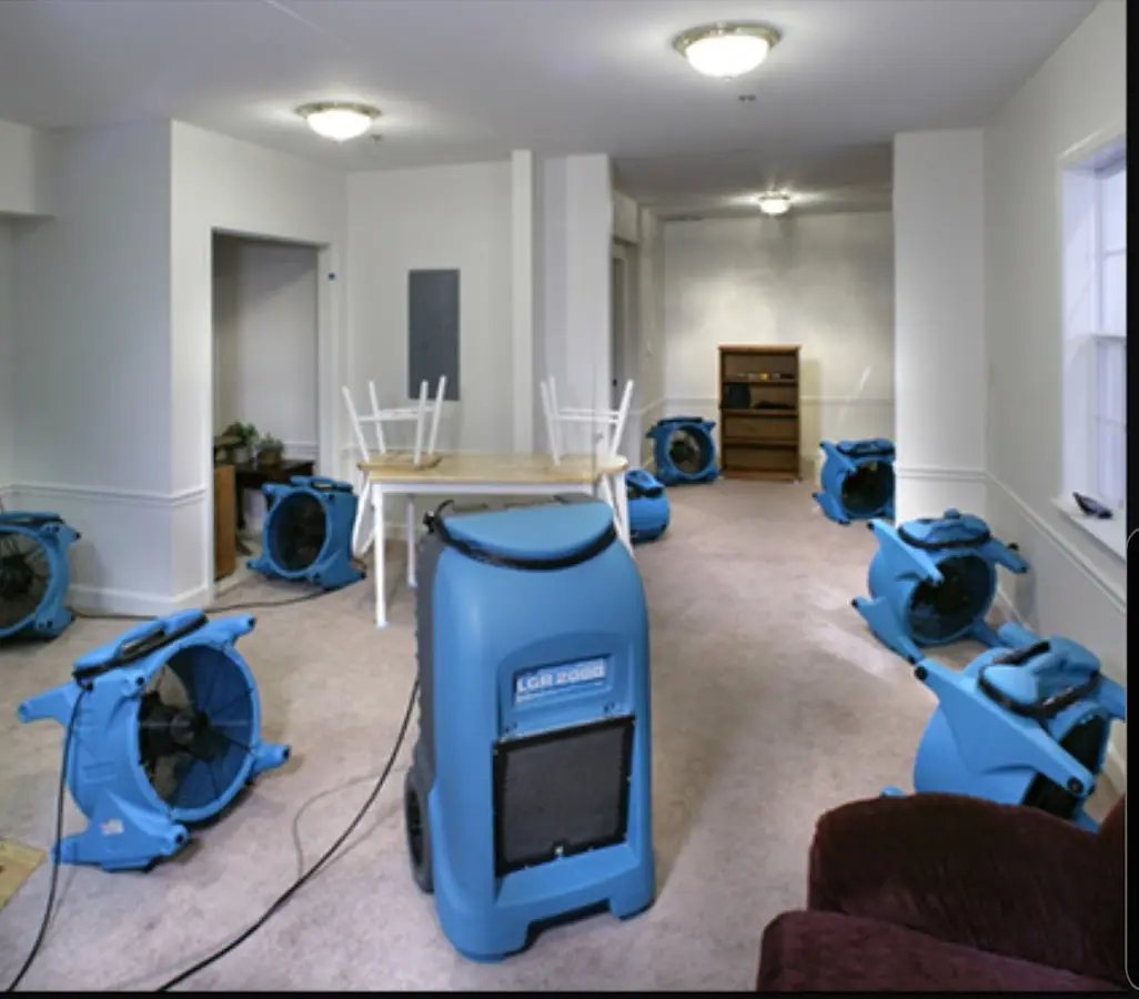 Air movers and dehumidifier setup for Water Damage Restoration in Wyldwood